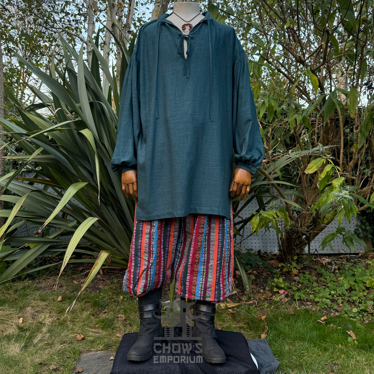 Teal cotton and linen medieval LARP shirt with long sleeves, front view.