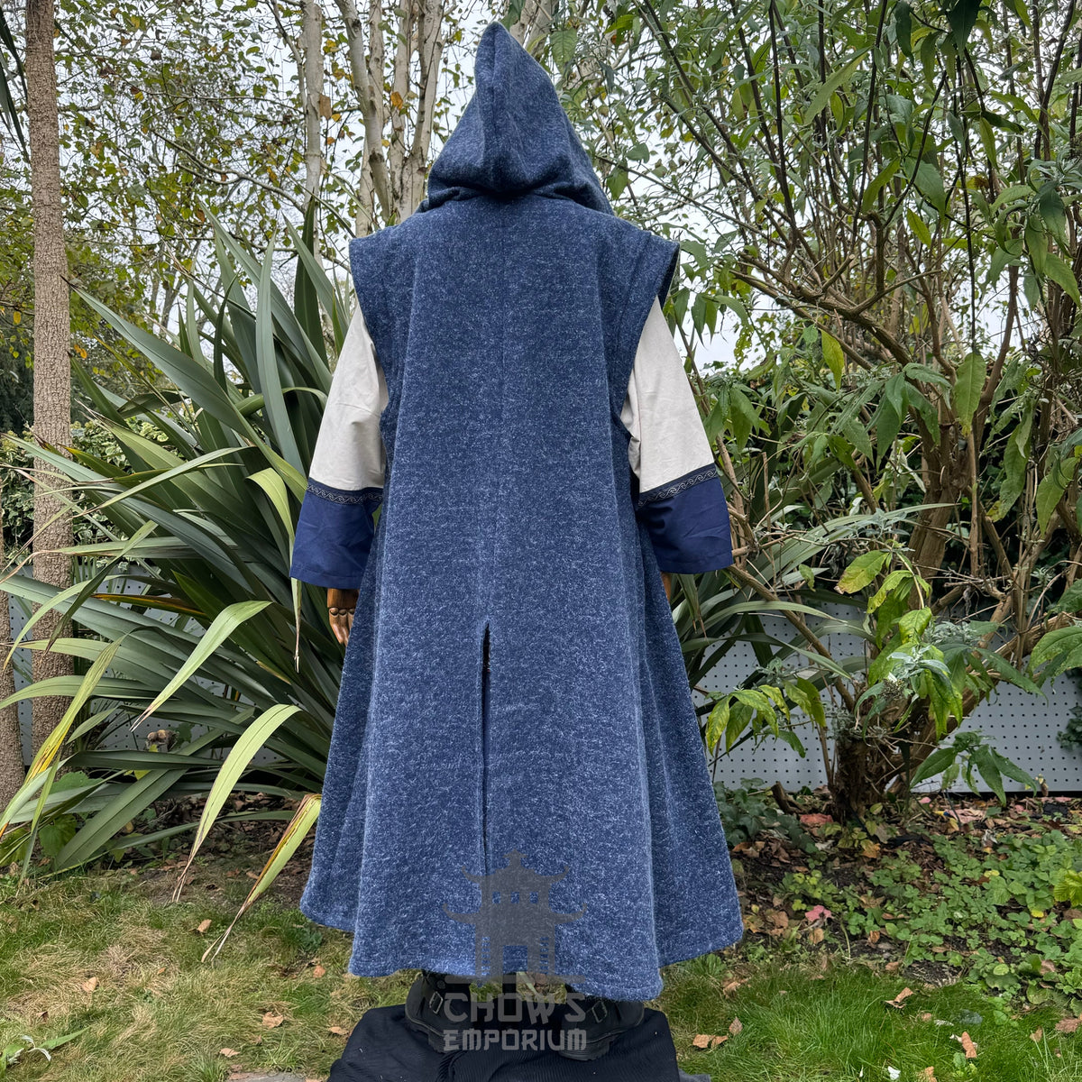 Back view of hooded blue robe outdoors for medieval LARP setting.