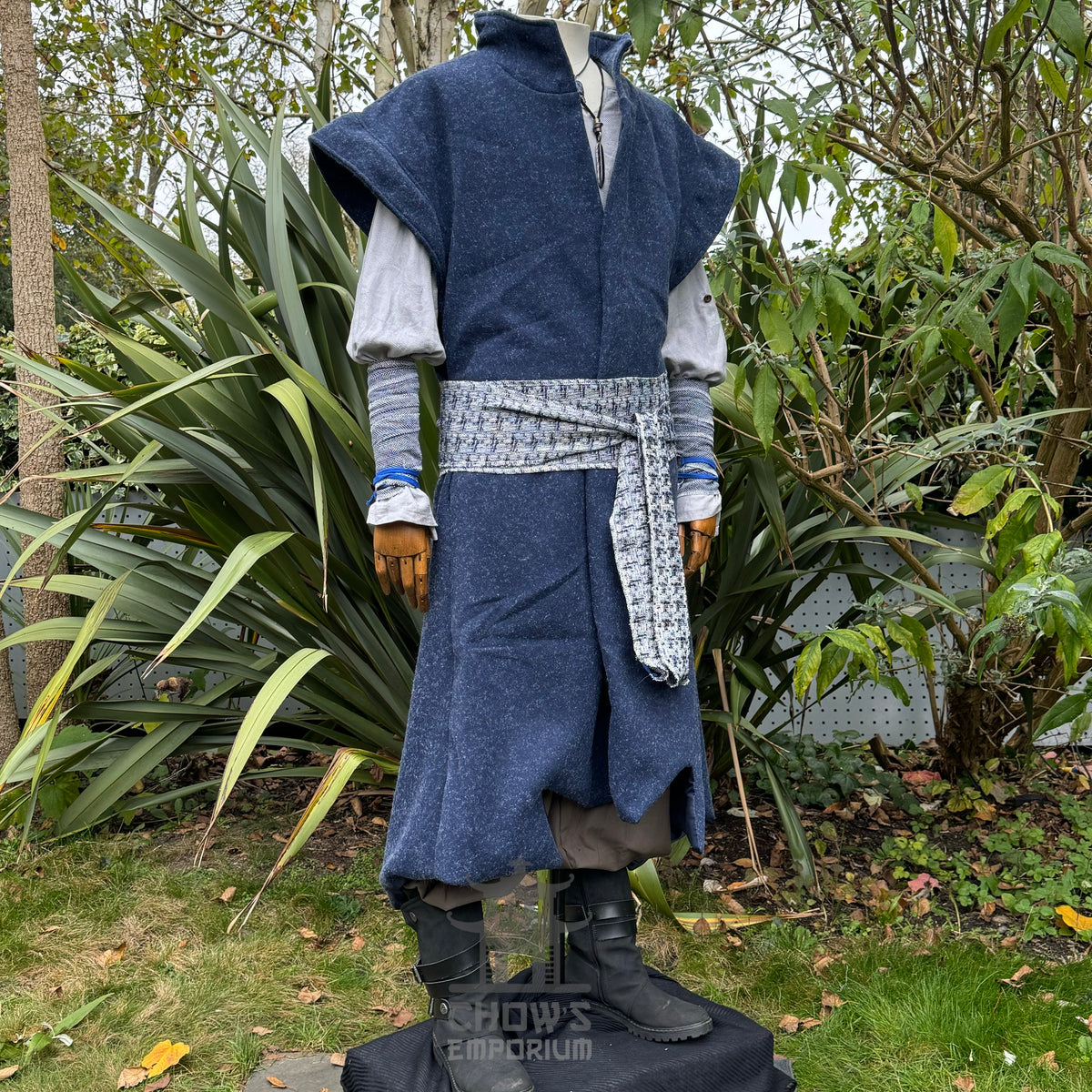 Angled front view of blue wool high-collar LARP waistcoat, fantasy cosplay costume accessory.