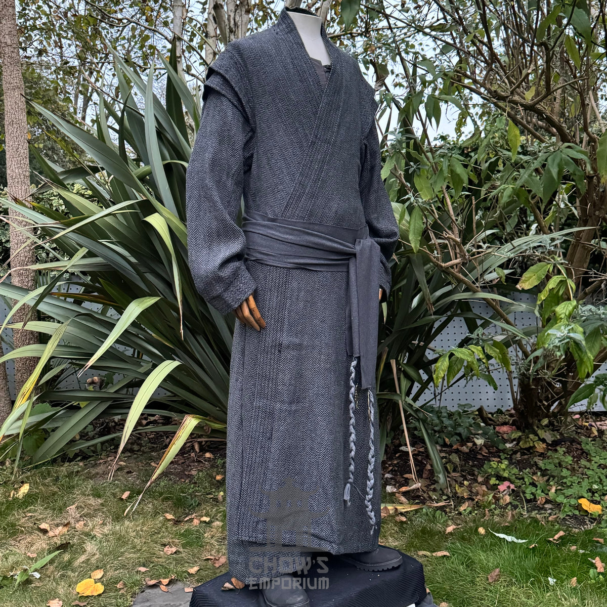 Grey mystic sorcerer LARP outfit, textured robe and sash, side view.
