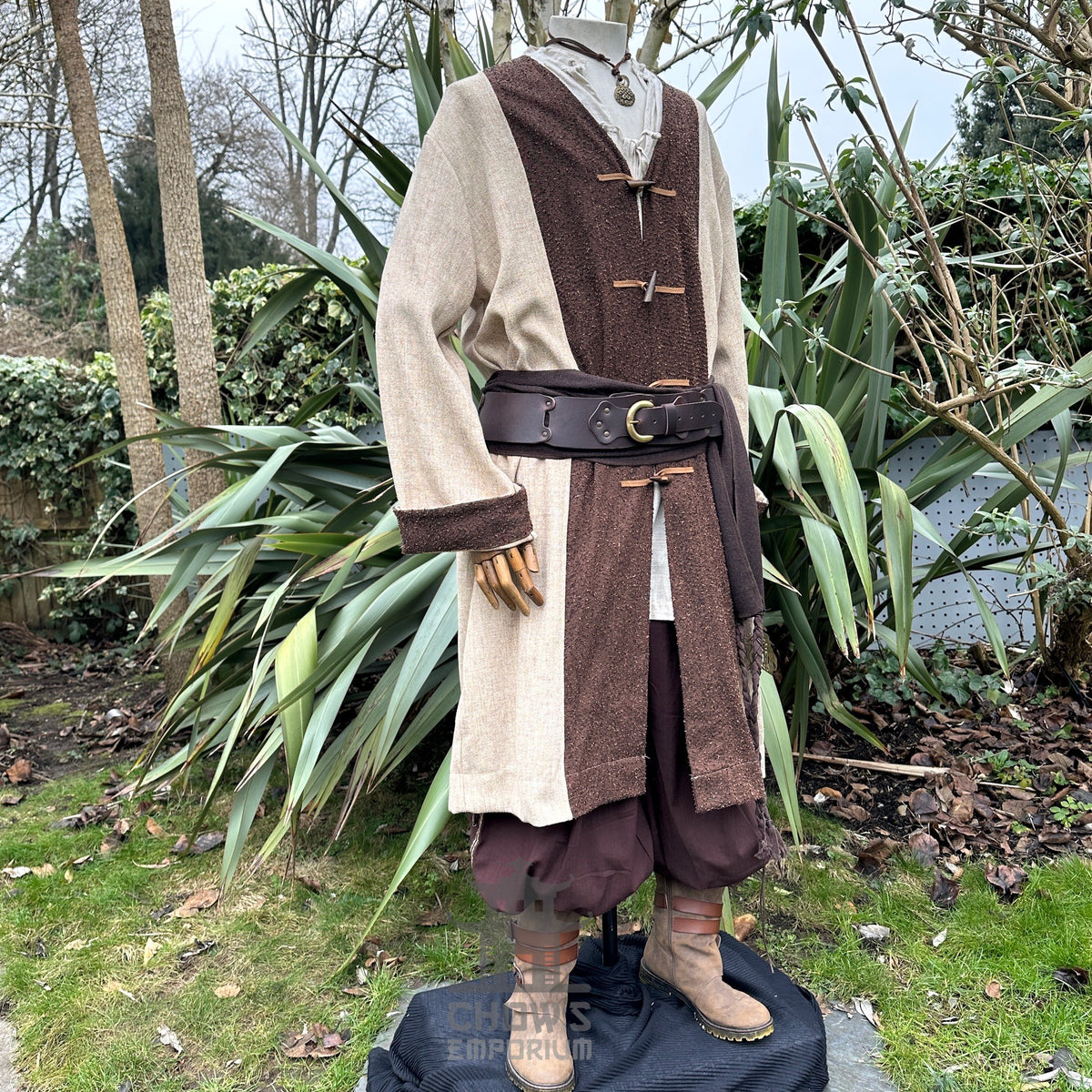 Side view of two-tone beige and brown medieval LARP coat, fantasy cosplay costume for rogues.