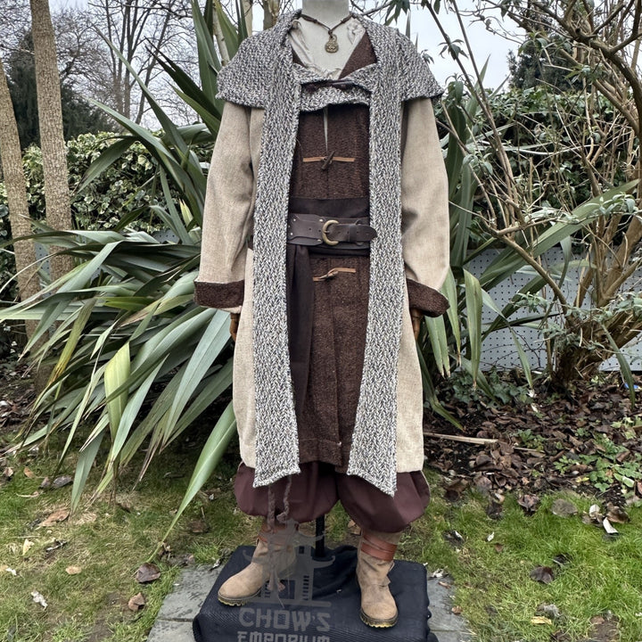 Medieval LARP outfit front view, featuring a two tone jacket, hood and trousers. For Renaissance Faire and historical roleplay events.