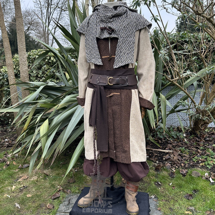 Medieval LARP outfit side view, featuring a two tone jacket, hood and trousers. For Renaissance Faire and historical roleplay events.