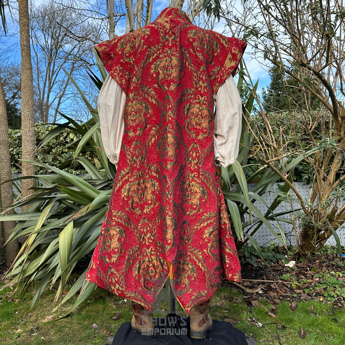 Back view of ornate red medieval LARP waistcoat with gold foliage pattern.