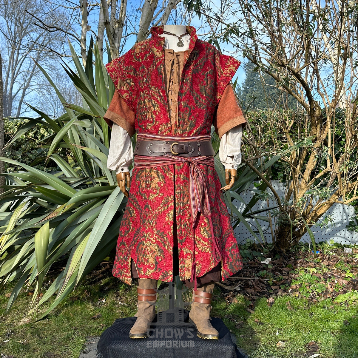 Outdoor shot of gilded crimson waistcoat with medieval belt for LARP.