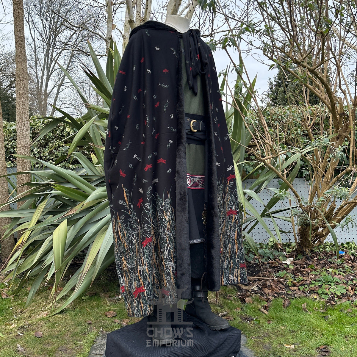 Black fur-lined cloak with red and silver embroidery, displayed for LARP.