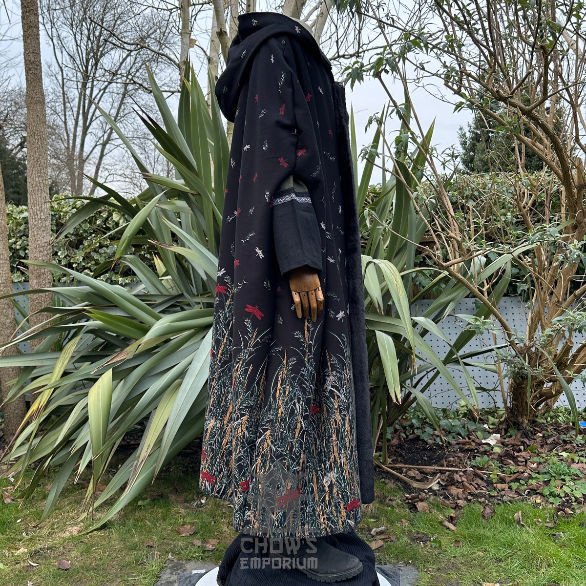 Black fur-lined cloak with intricate designs for medieval LARP, side view.