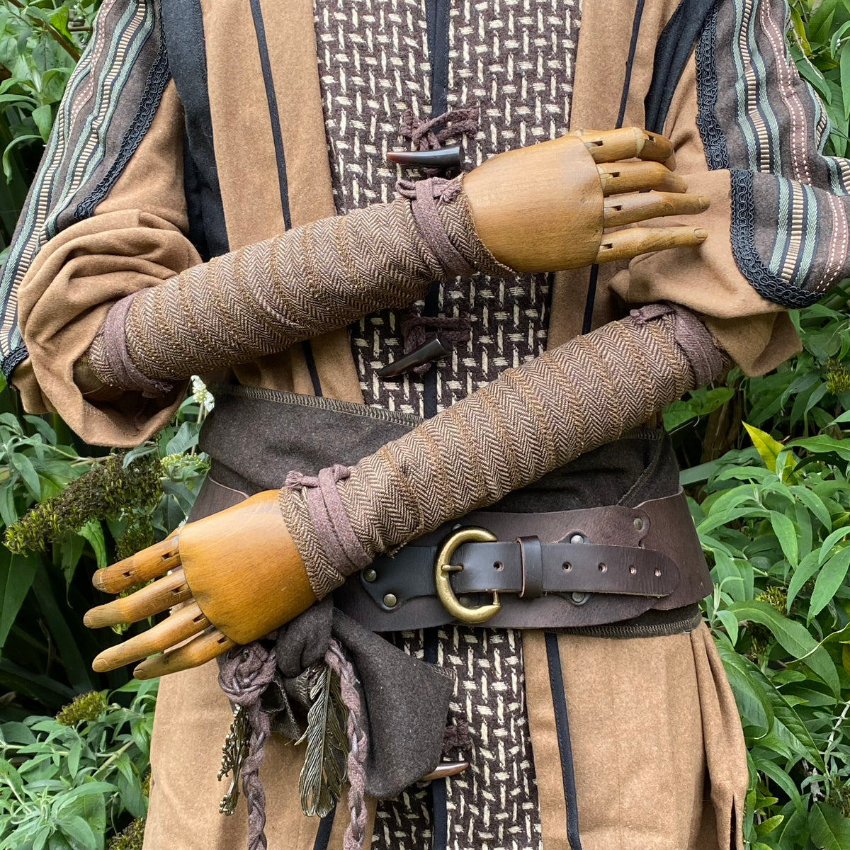 Brown herringbone arm wraps and sash styled on a mannequin for LARP.