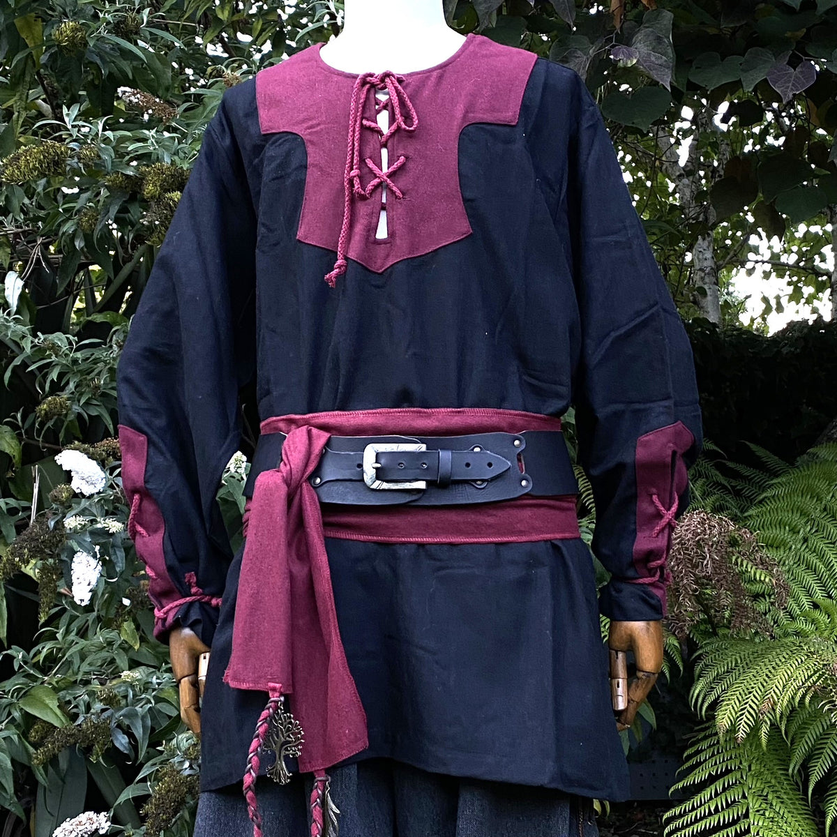 LARP medieval outfit with red-trimmed black tunic and double belt detail.