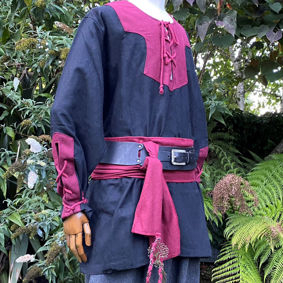 Red and black medieval LARP outfit with sash, belt, and waistcoat.