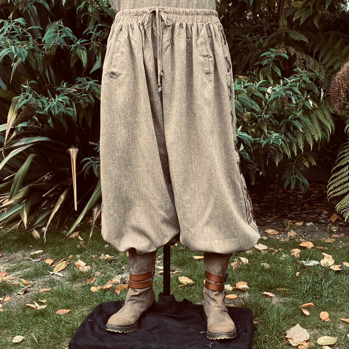 Loose brown medieval pants with lace detail, styled for LARP.