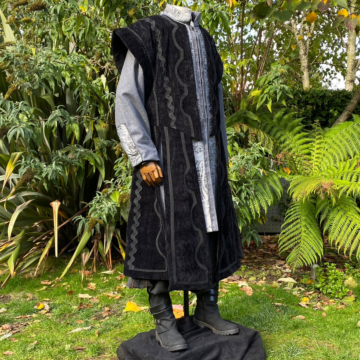 Medieval LARP outfit with black panel waistcoat.