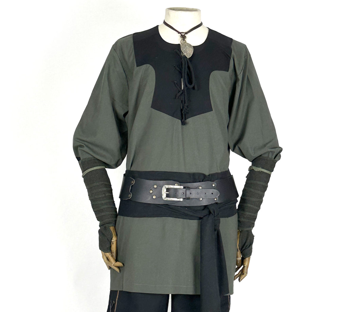 LARP medieval outfit with black waistcoat, shirt, hood, and vambraces.