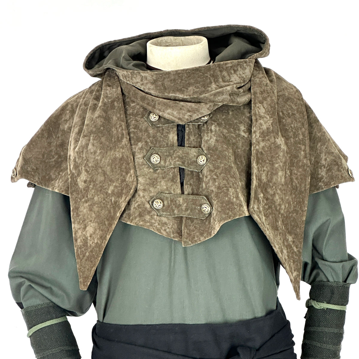 Green medieval LARP outfit with brown hood, arm wraps, and black sash.