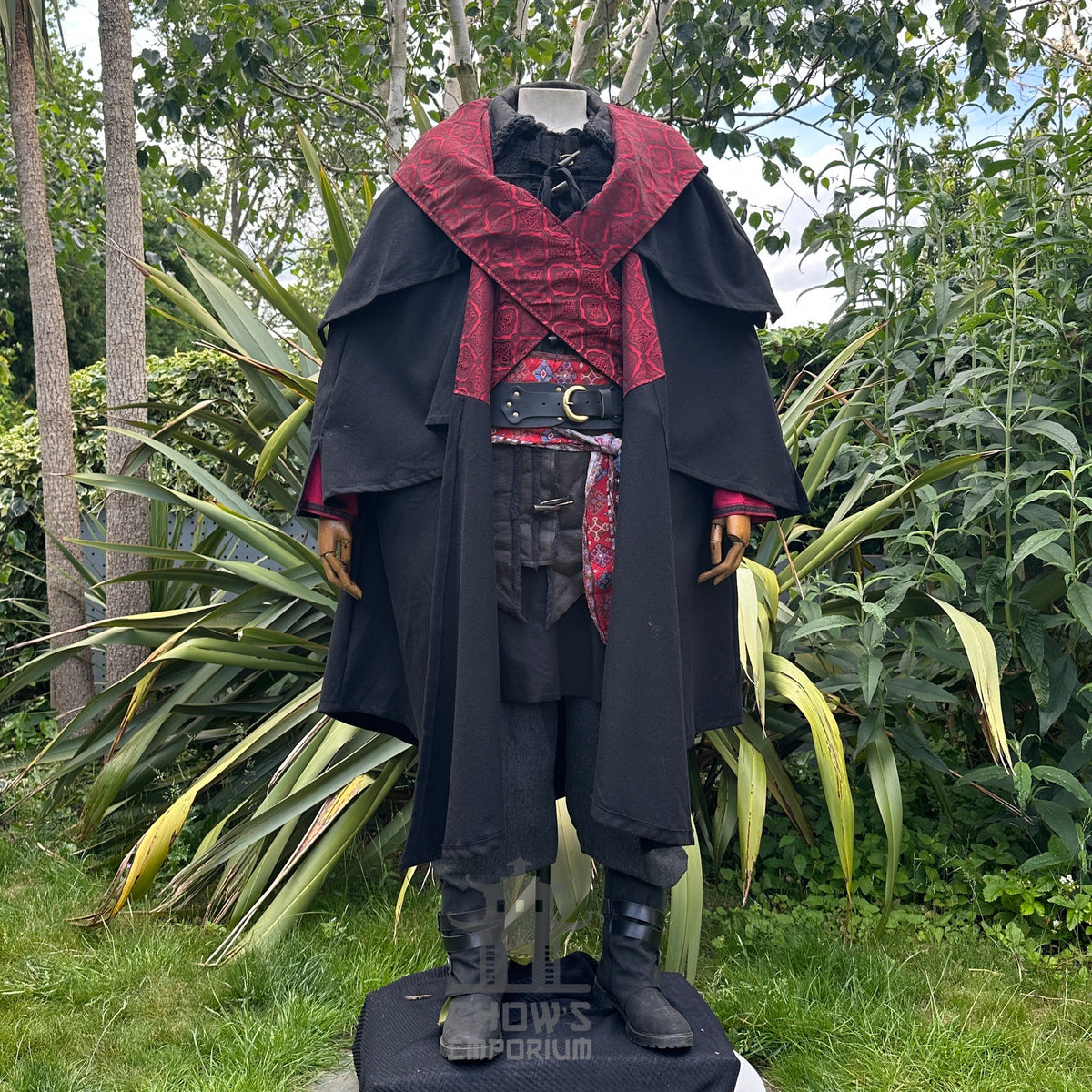 Front view of black and red LARP cloak, medieval fantasy cosplay costume for necromancers.