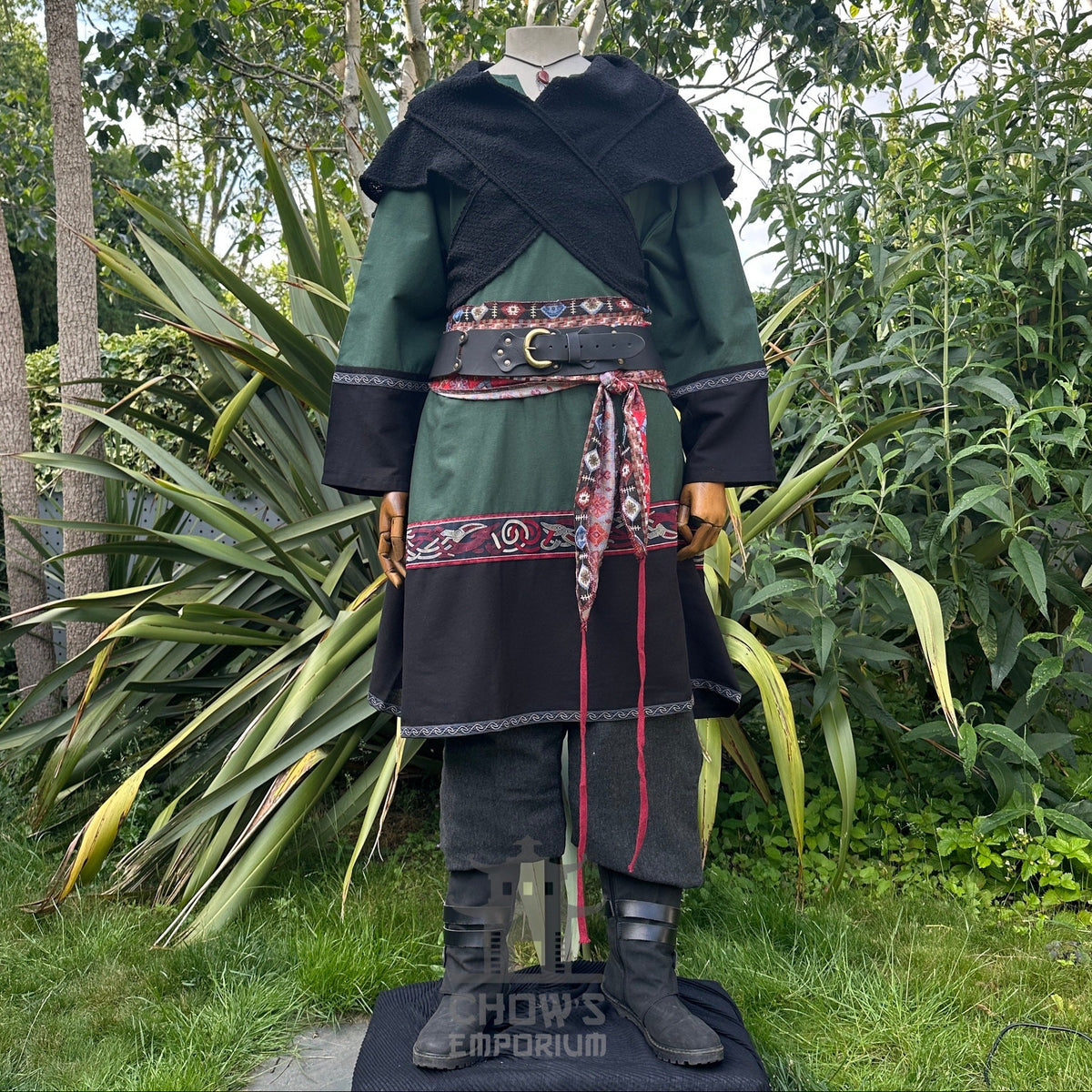 Emerald and black medieval LARP outfit with tunic, hood, and trousers.