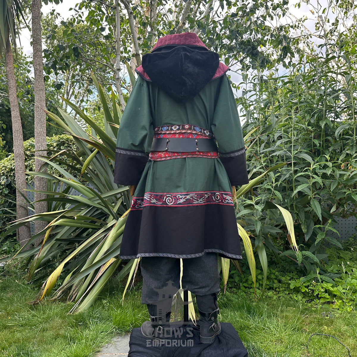 Green and black LARP medieval outfit with tunic, hood and sash, rear view.