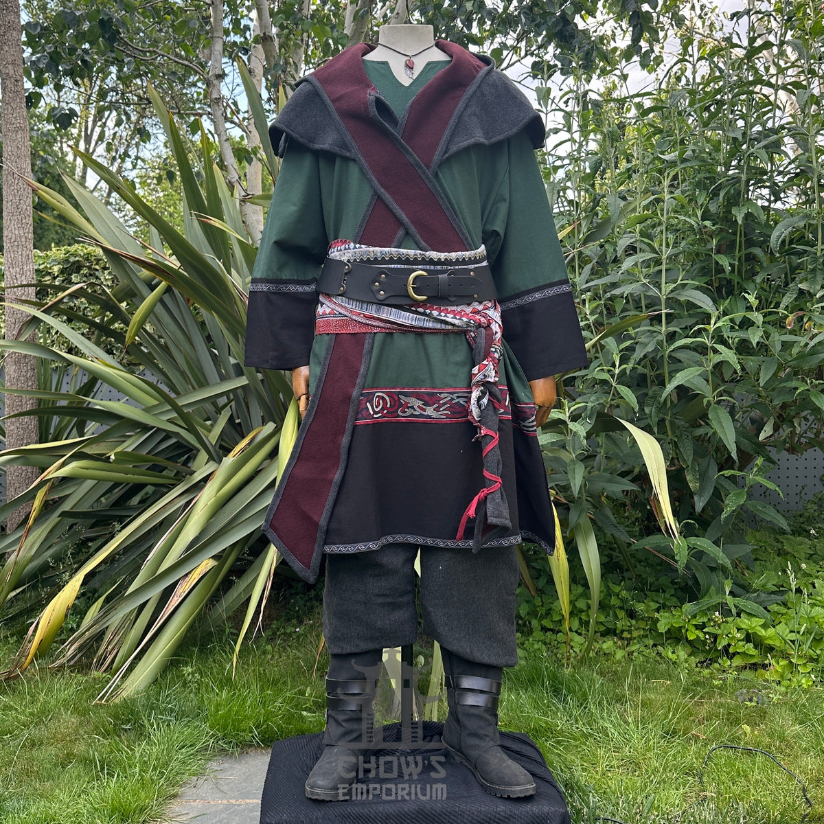 LARP outfit with green tunic, black trousers, and reversible hood.