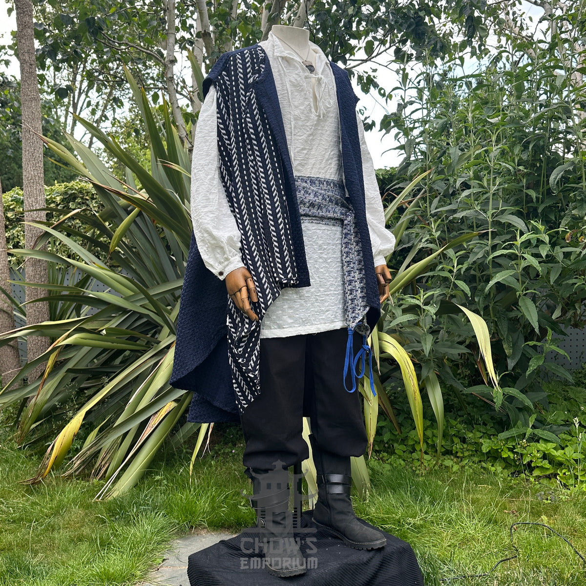 Azure pirate LARP set with blue waistcoat, white shirt, patterned sash.
