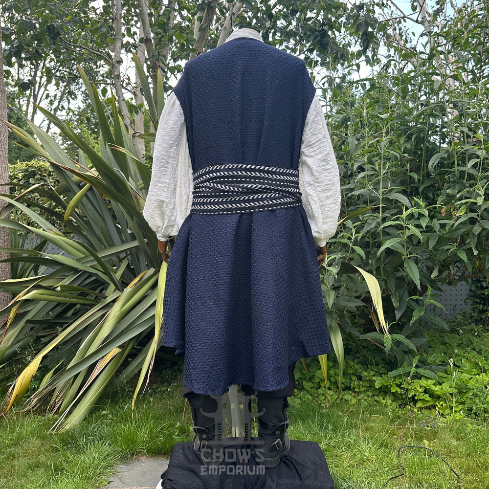 Medieval LARP costume back view, includes blue and white waistcoat with asymmetrical front panel, matching sash, and trousers for Ren Faire and roleplay events.