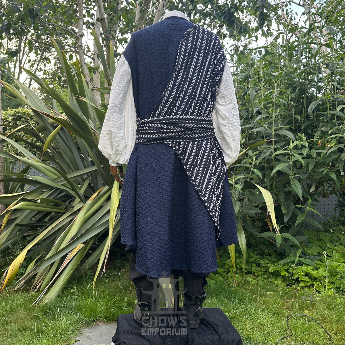 Navy blue waistcoat with white, black sash, medieval LARP attire, back view.