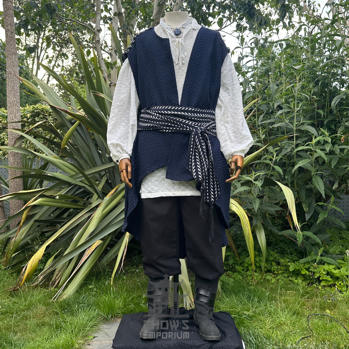 Front view of blue and white LARP waistcoat with shoulder panel styled behind for alternate wear.