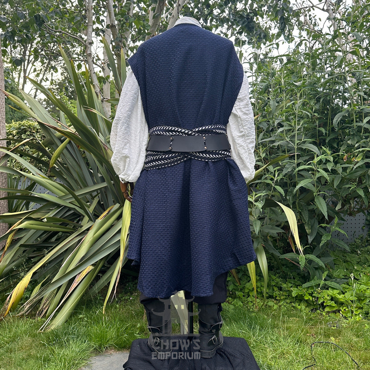 Back view of blue and white pirate waistcoat styled.