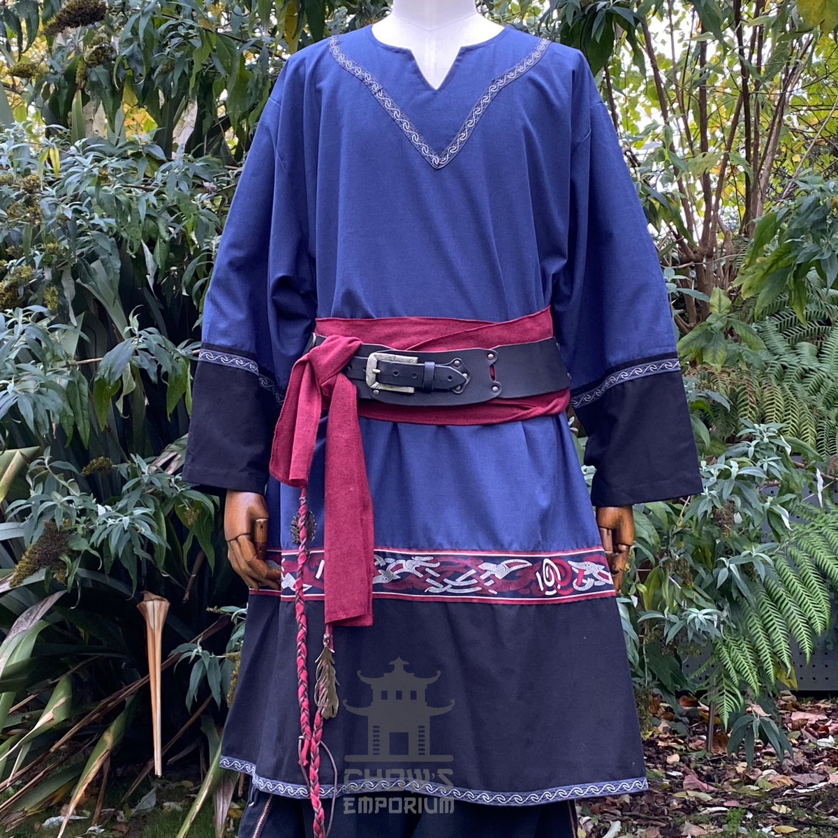 LARP Viking outfit: blue tunic, red sash, black pants and hood.
