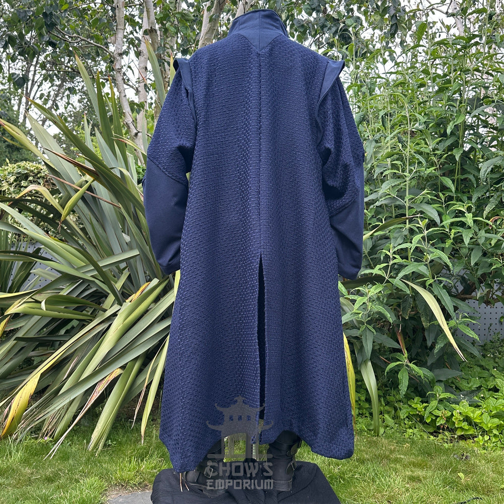 Medieval LARP costume back view featuring a robe, waistcoat, shirt, pants, sash and necklace. For Renaissance Faire and historical roleplay events.