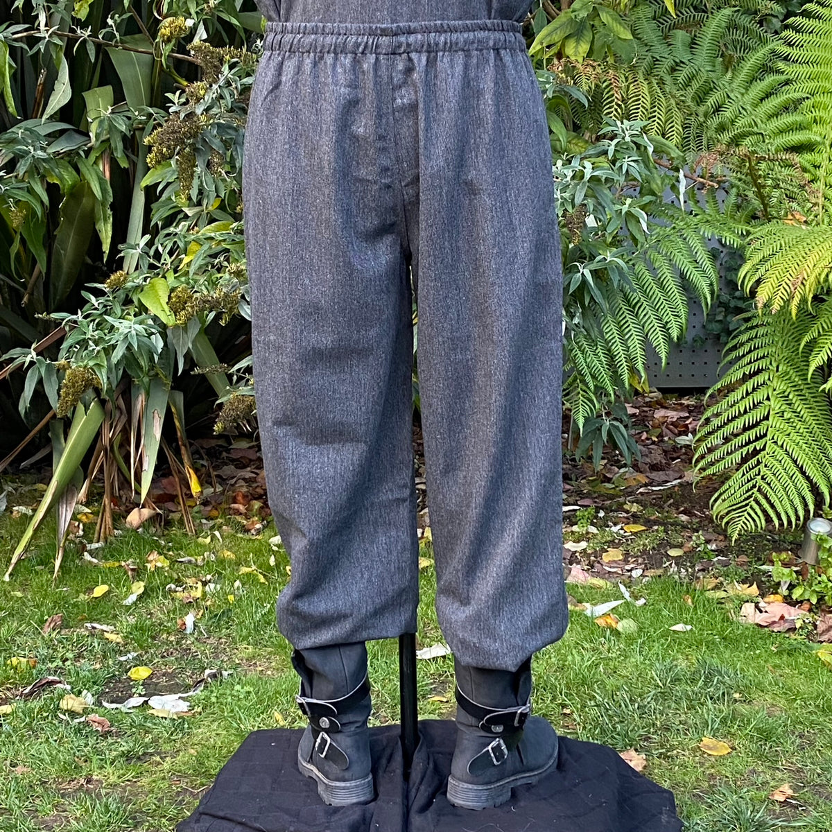 Back view of grey wool LARP trousers showing relaxed fit and reinforced seams.