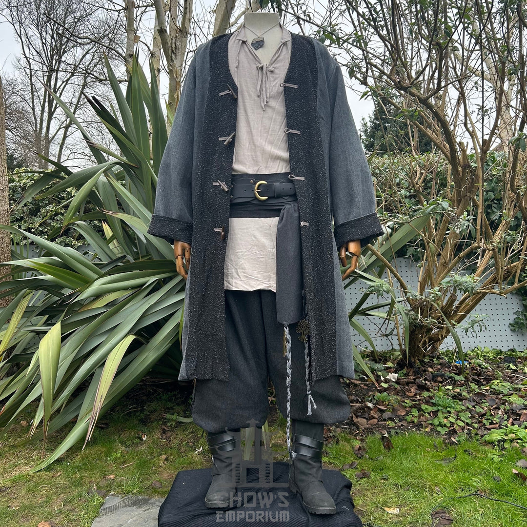 Medieval LARP outfit front view, featuring a grey two-tone jacket, shirt, trousers, belt and sash. For Renaissance Faire and historical roleplay events.