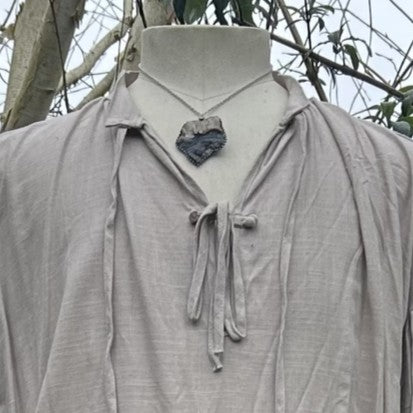 light grey cotton-linen medieval shirt styled.