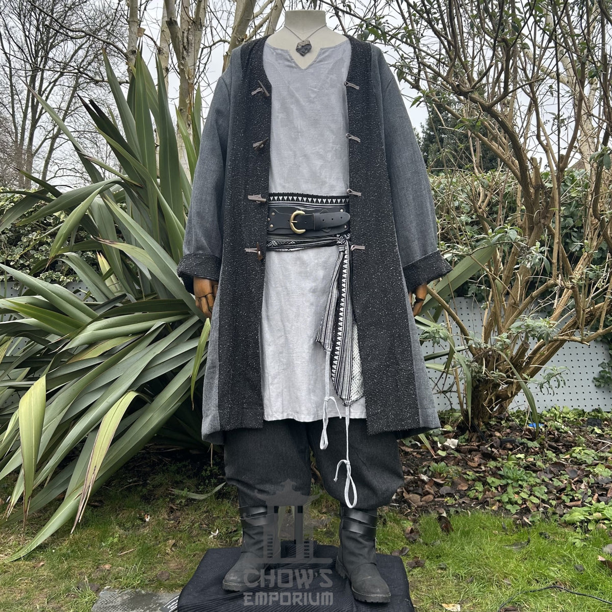Outdoor full-length view of grey and black pirate LARP coat, medieval fantasy cosplay costume.