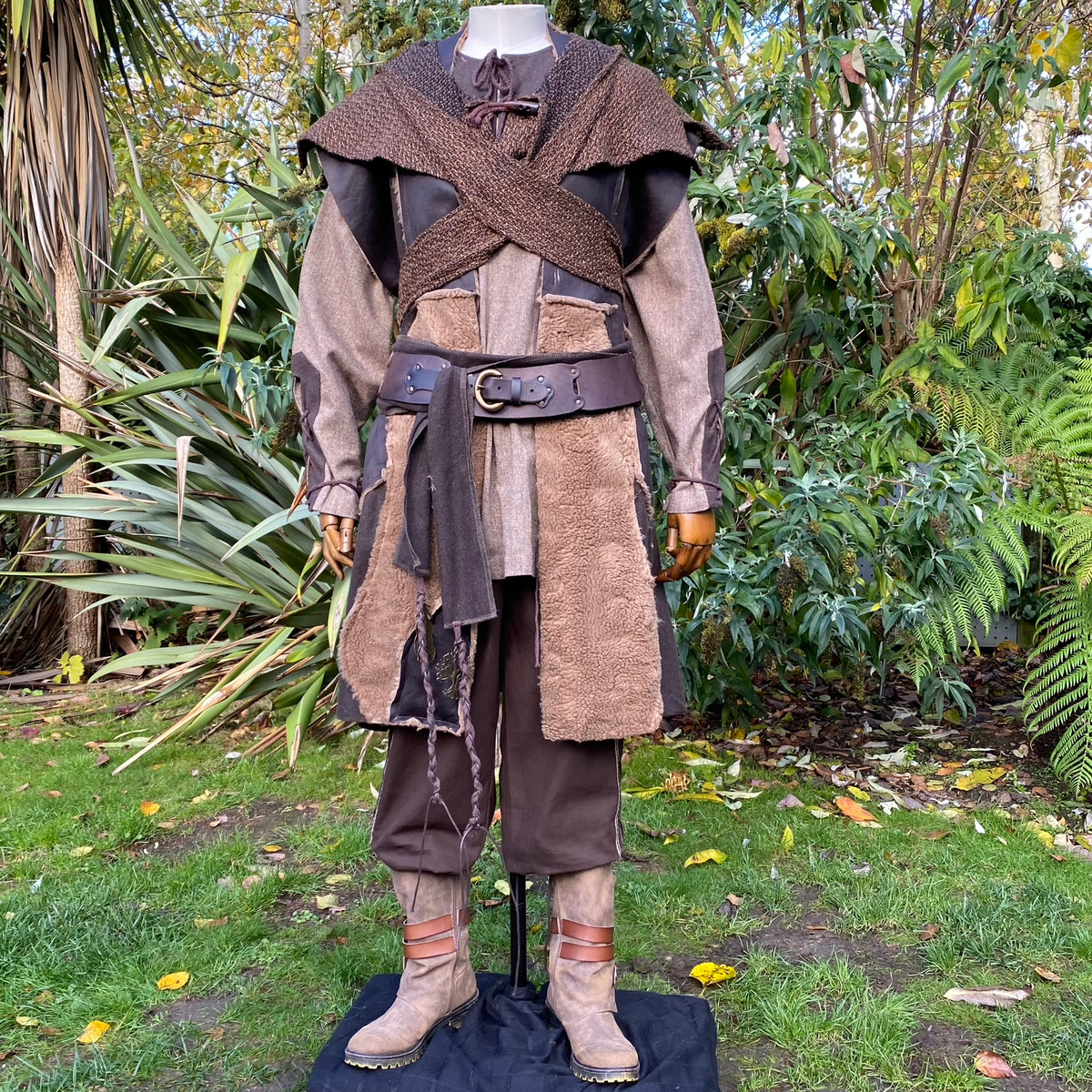 Viking LARP waistcoat with crossed shawl and earthy tones.