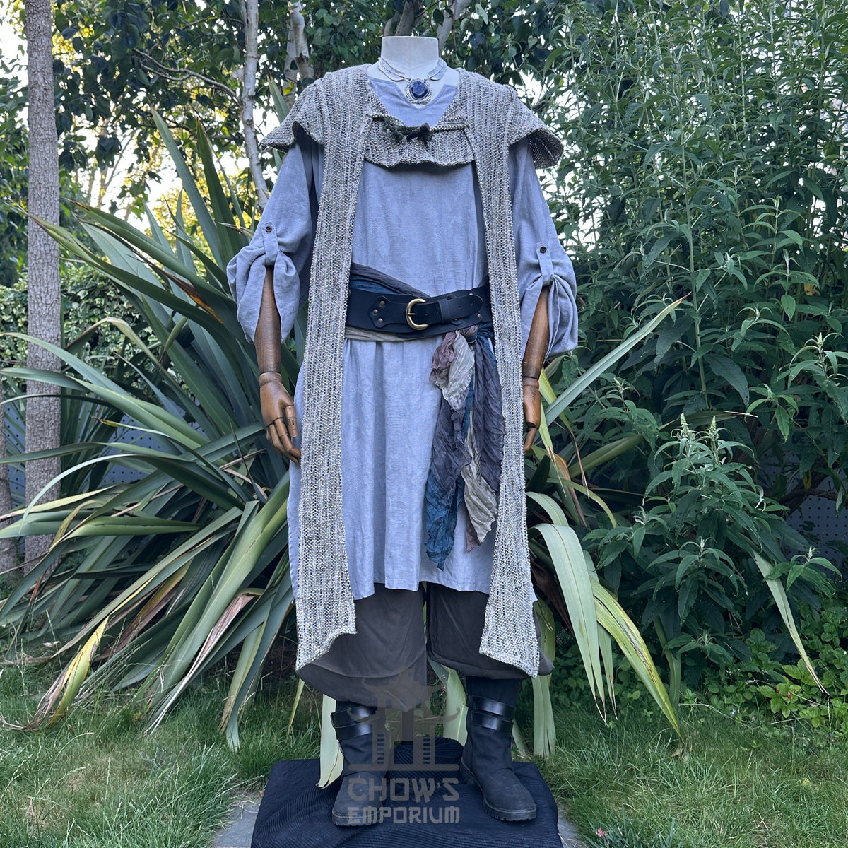 Grey medieval LARP outfit with tunic, hood, trousers, and sash displayed.