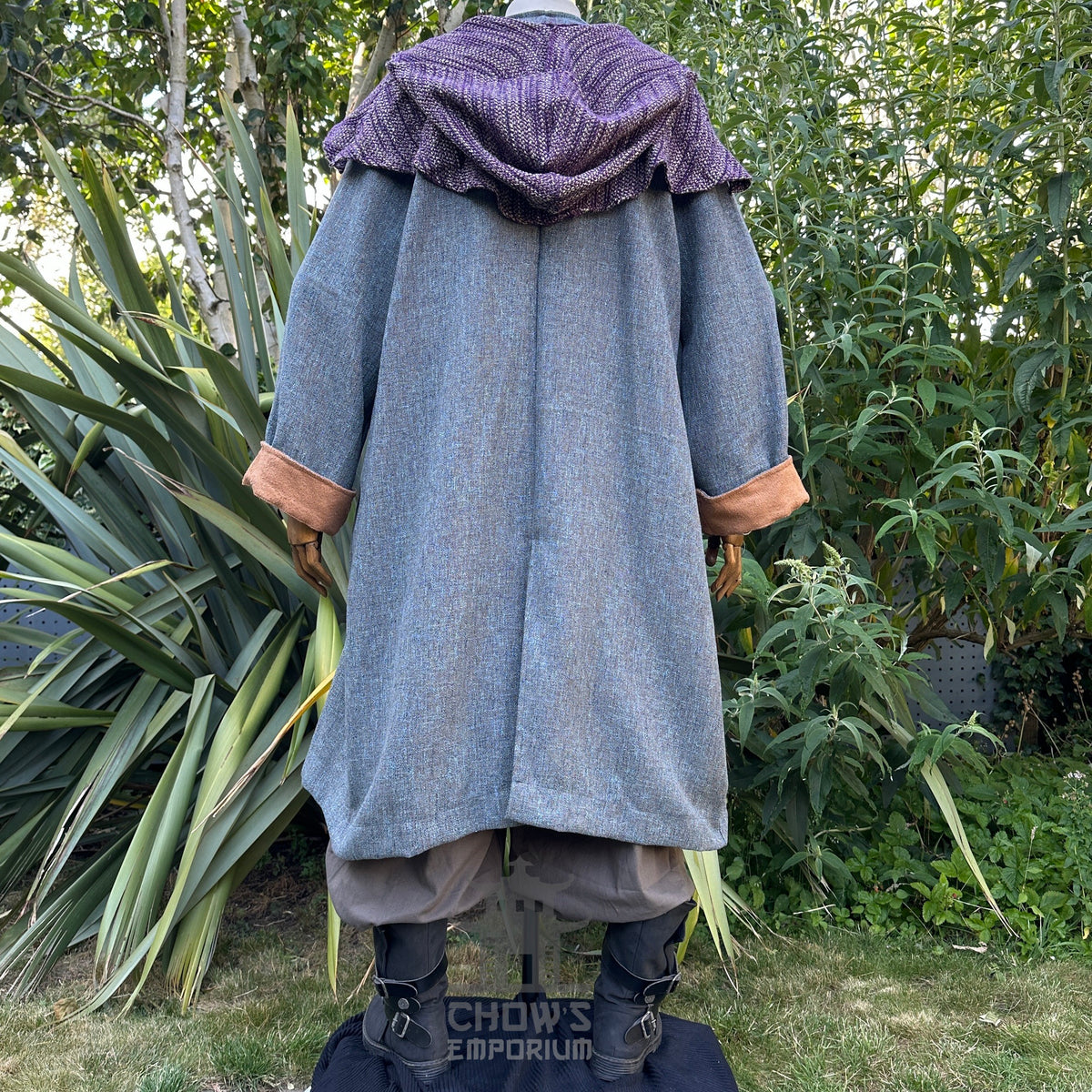 Back view of Ocean Cleric LARP set with blue robe and purple hood.