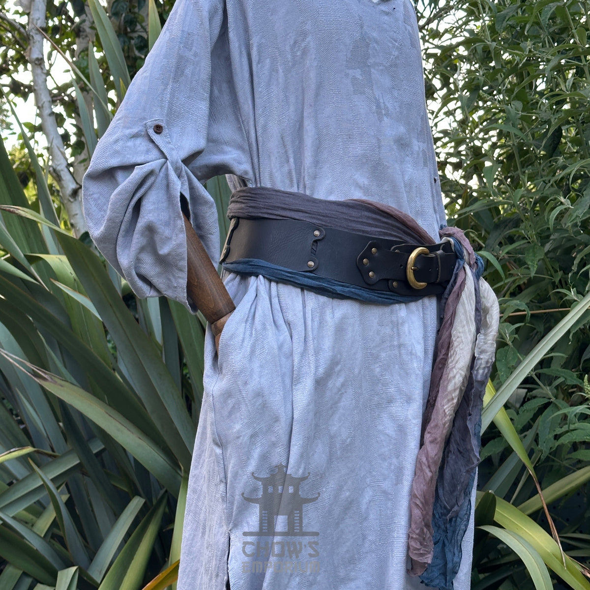 Grey LARP tunic, trousers, and sash detail with natural background.