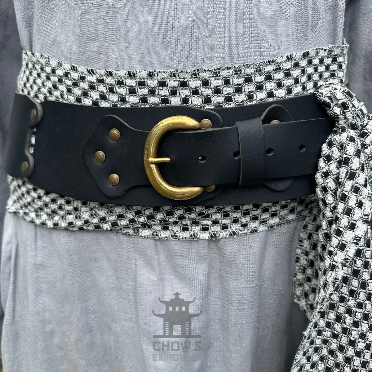 Black and white check LARP belt and sash, buffalo leather, front view.