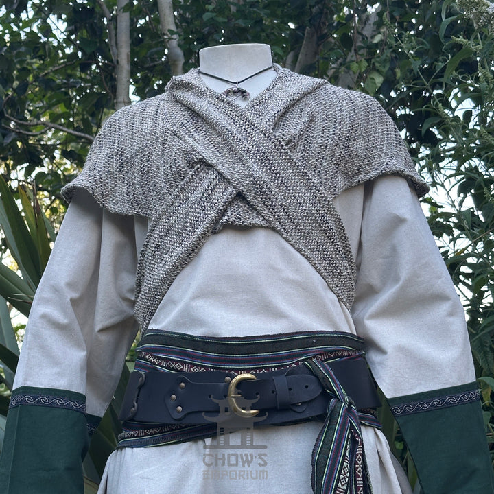 LARP medieval costume with grey knit shawl over cream tunic, waist up view.
