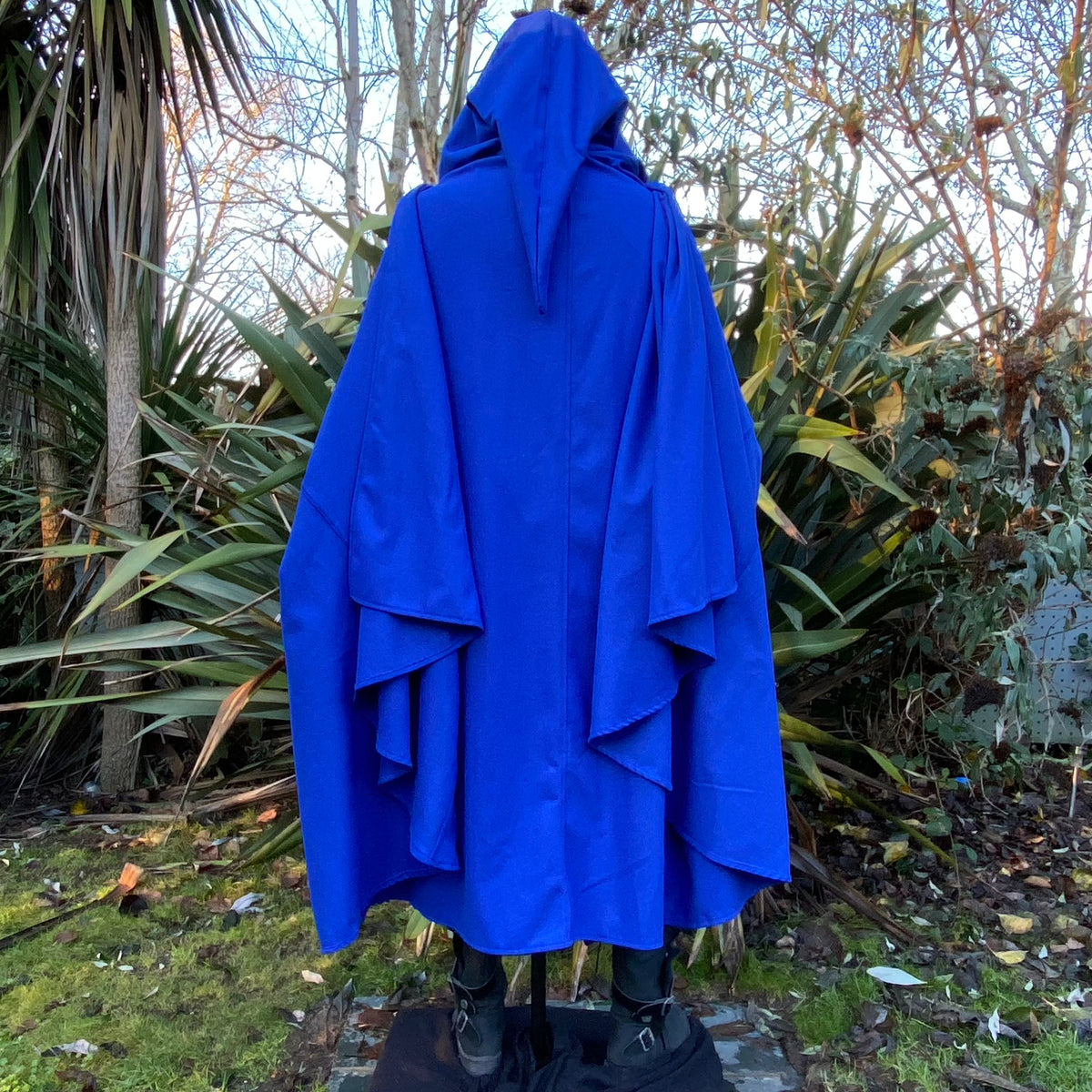 Viking LARP cloak in blue, rear view with hood.