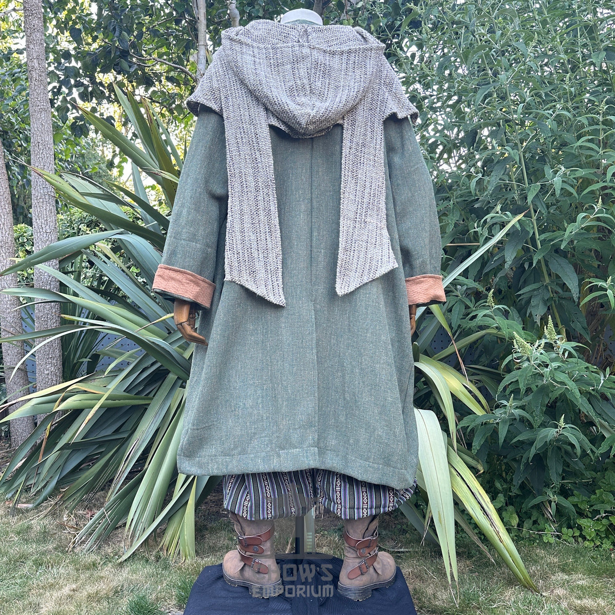 Back view of LARP woodland outfit with green coat and knit hood.