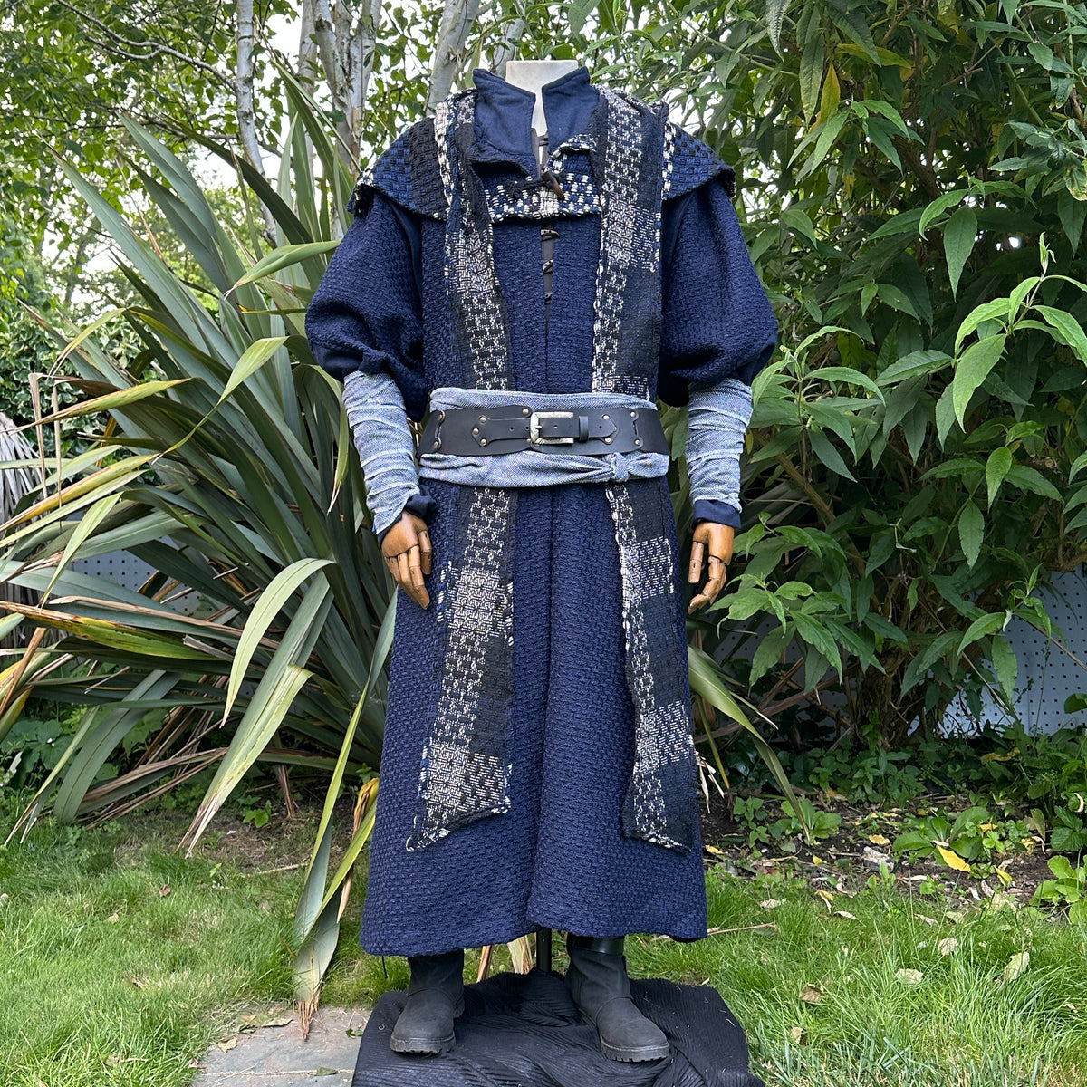 LARP medieval outfit featuring navy textured robe with patterned panels.