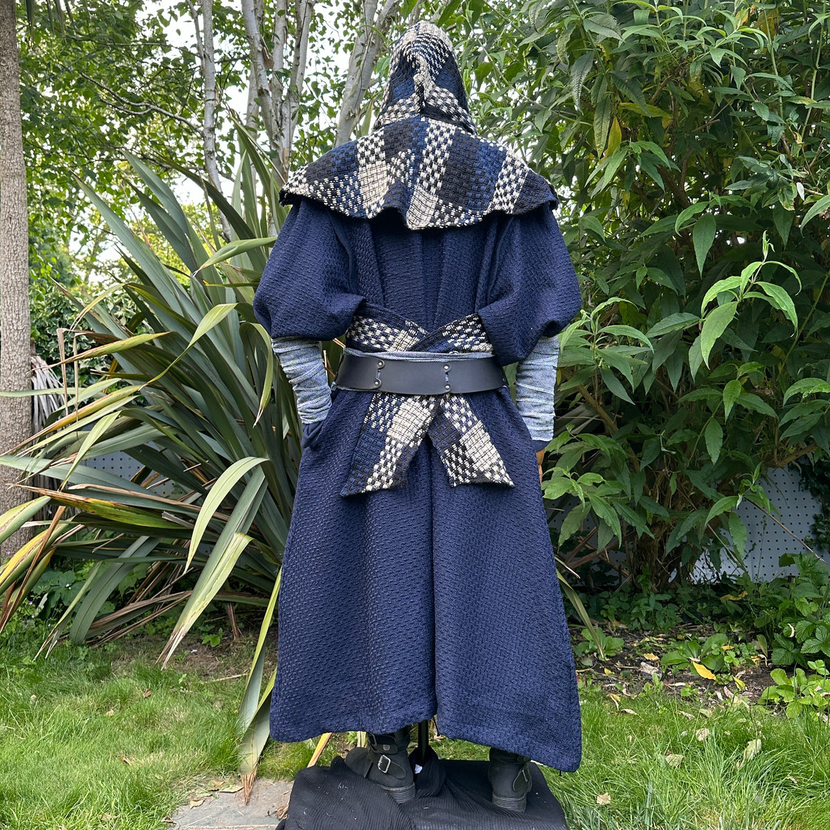 Medieval LARP navy robe back view, checkered hood and belt.