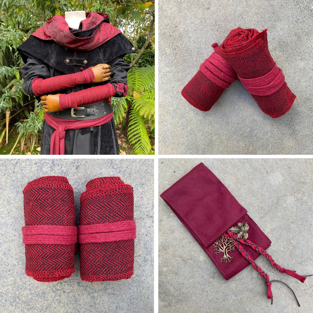 Medieval LARP arm wraps worn with red sash and black hood.