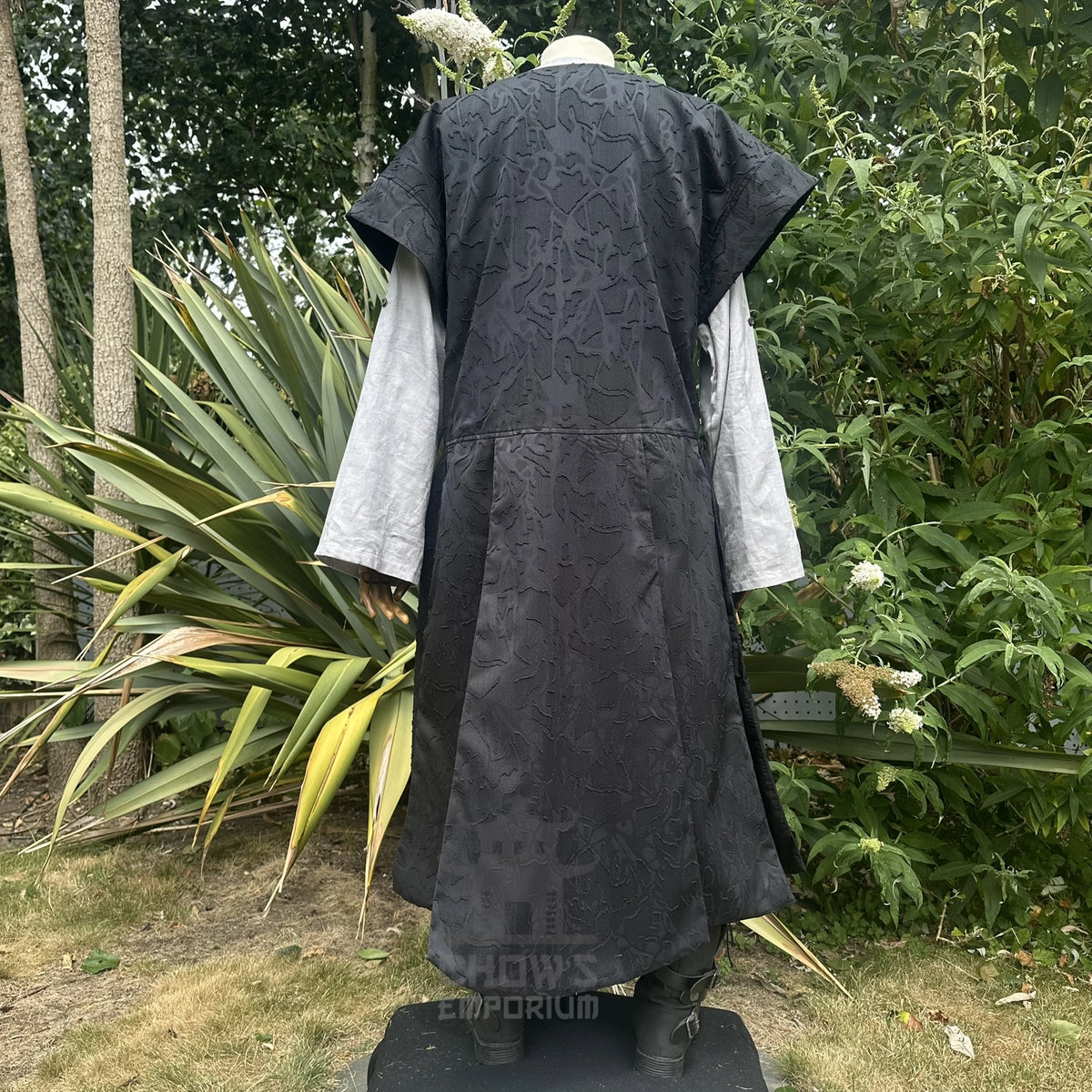 Black panelled waistcoat and hood set, hood down, back view showing the panelled back. Belt sold separately.