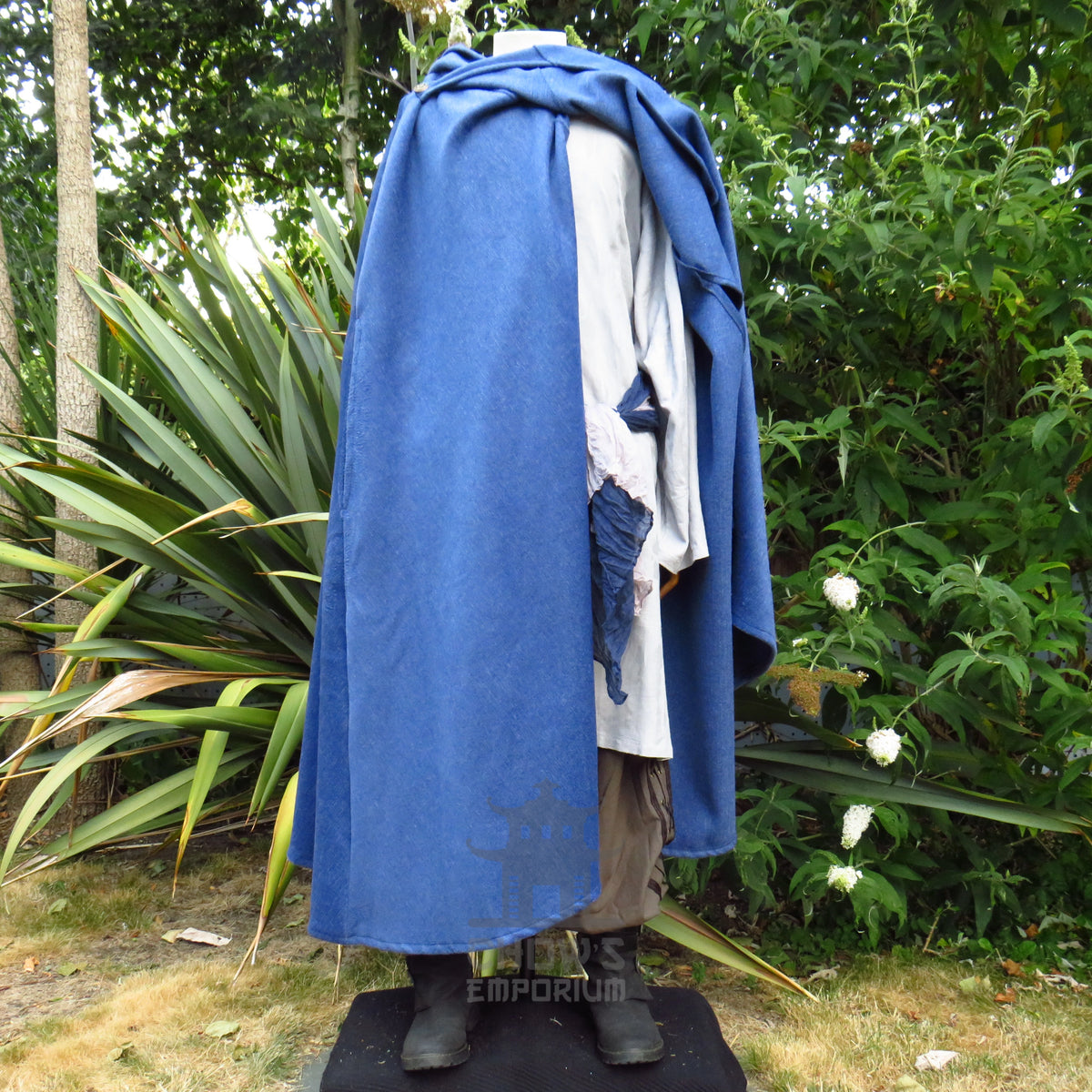 Blue medieval cloak rebuttoned at the shoulders to sit as a robe