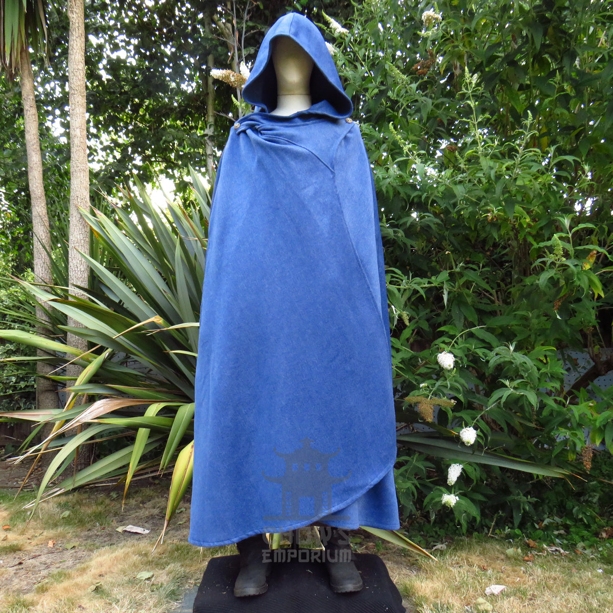Blue wool cloak with the hood up and the fabric draped across the front