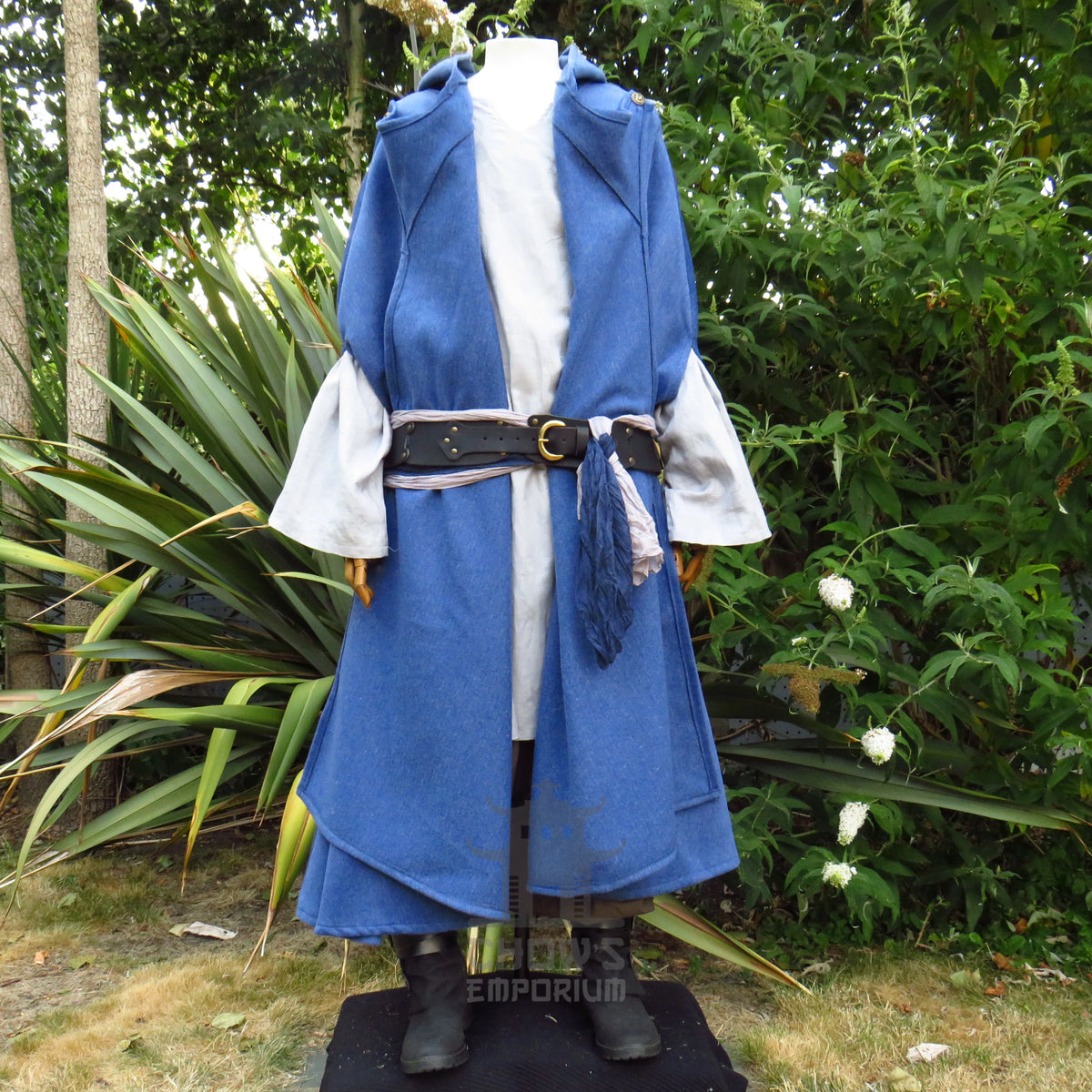 Blue wool cloak worn belted over a tunic with a sash, belt and tunic sold separately