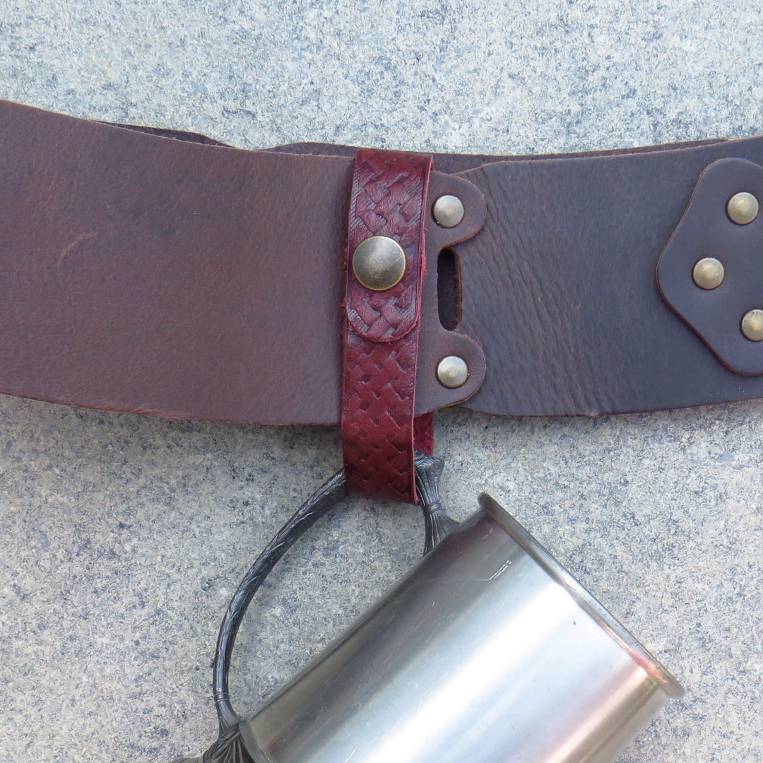Dark red Celtic knot tankard loop on a belt with a tankard hanging