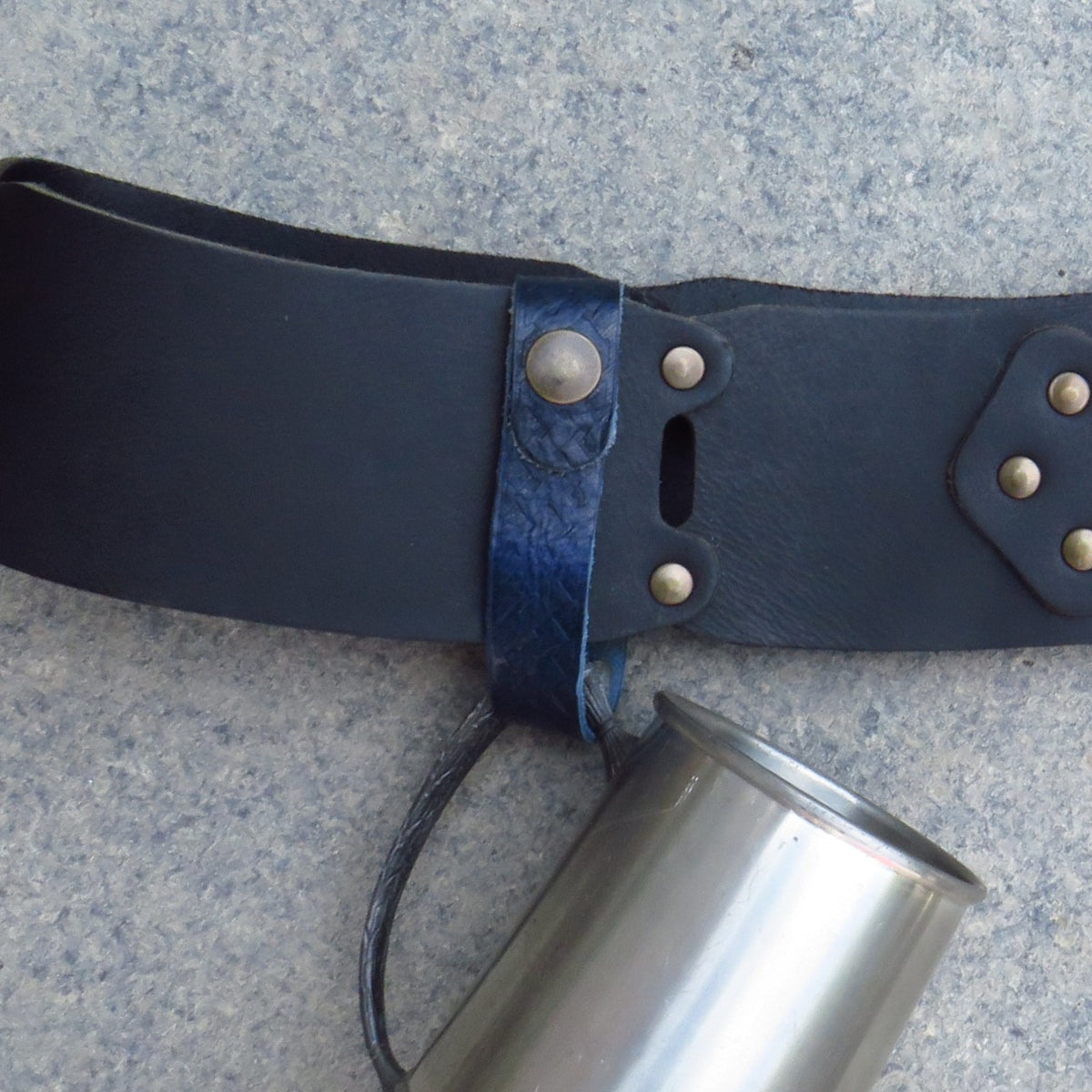 Navy leather tankard loop with Celtic knot embossing carrying a tankard